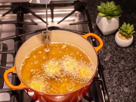 Chop 2 onions into the hot cooking oil and stir until golden brown. Deep Frying 101: How to Deep Fry on the Stovetop | Good ...