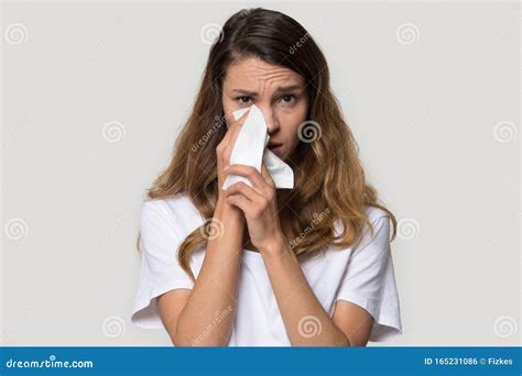Upset Unhappy Young Woman Crying Wiping Tears With Napkin Stock Photo