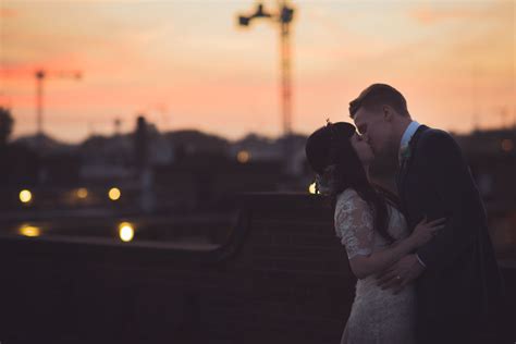 Urban Sunsetbride And Groom Kissbohorooftop Wedding Rooftop Wedding