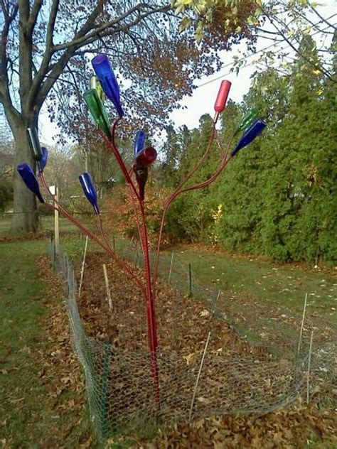 diy how to make a bottle tree for your garden dengarden