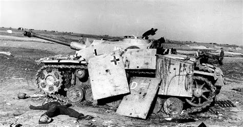 A Dead Crew Member Laying Next To His Destroyed Stuh 40 Ausf G After