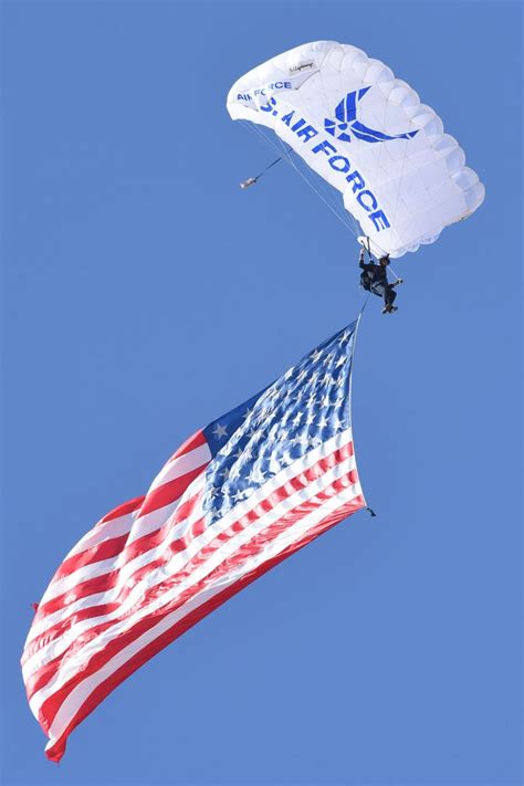 The Us Air Force Academy Wings Of Blue Parachute Team Demonstrate