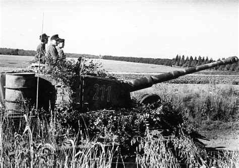 Camouflaged Tiger Of The Schwere Ss Panzer Abteilung 102 Near River