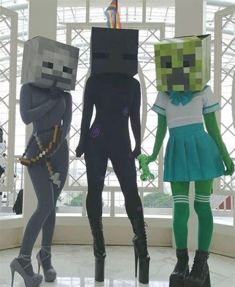 Three People Dressed Up As Minecraft Characters In Front Of A Window With Large Windows