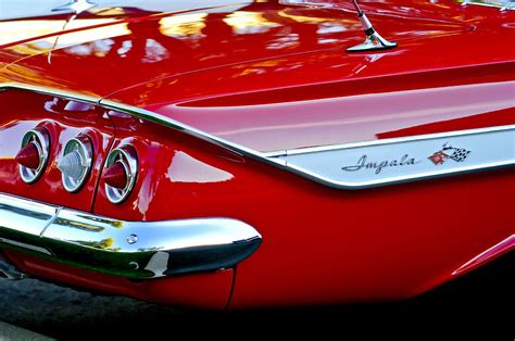 1961 Chevrolet Impala Taillight Emblem Photograph By Jill Reger