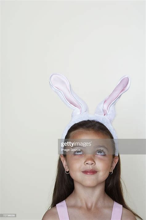 Girl Wearing Rabbit Ears High Res Stock Photo Getty Images