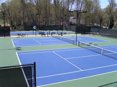Resurfaced Three Country Club Tennis Courts In Olympic Blue And Us Open