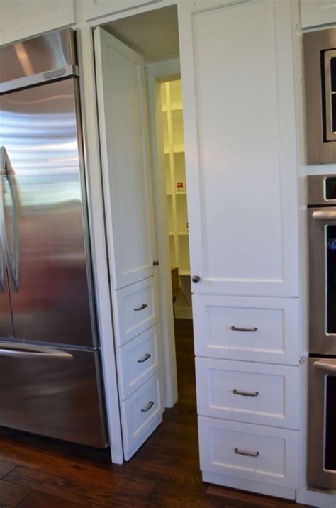 Hang Pots Or Cabinets On Load Bearing Wall Then Fake Cabinet Door To