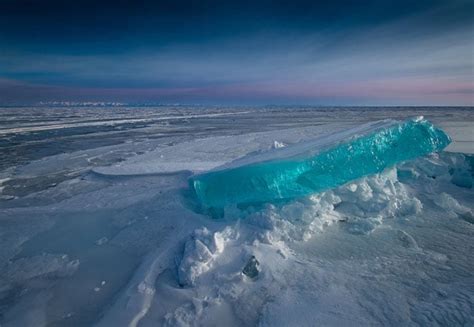 The Turquoise Ice Found In Lake Baikal Looks Like A Gem