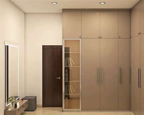 L Shaped Modern Wardrobe With Loft Section Livspace