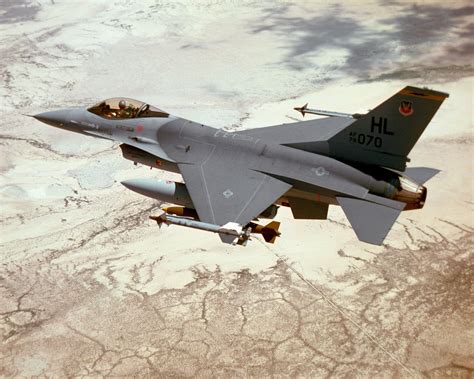 An Air To Air Left Rear View Of An F 16 Fighting Falcon Aircraft In