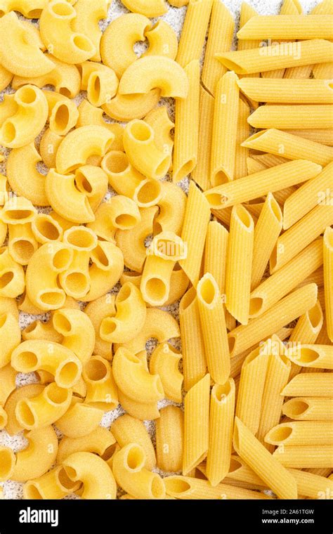 Types Of Uncooked Pasta Dry Penne Pasta And Chifferi Fill The Frame