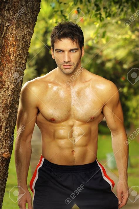 Natural Portrait Of A Very Fit Male Model Outdoors Stock Photo Picture