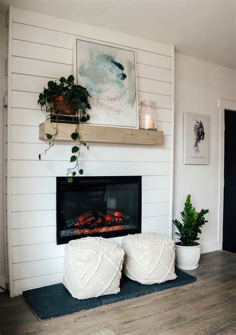 Dated Rock Fireplace Turned Electric Shiplap Fireplace Makeover