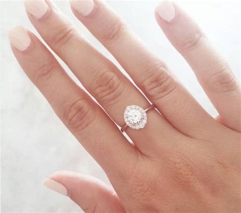 Whether you wear your diamond engagement ring and wedding band on your right hand or left, your index finger or thumb, your ring finger is not what matters. Why does a woman wear her engagement ring on her right ...