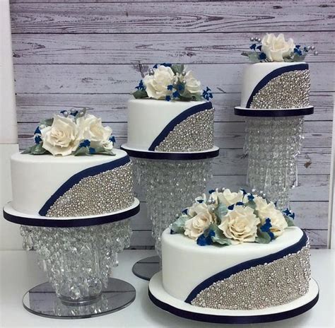 4 Tier Silver Ball And Navy Blue Wedding Cake Cake By Cakesdecor