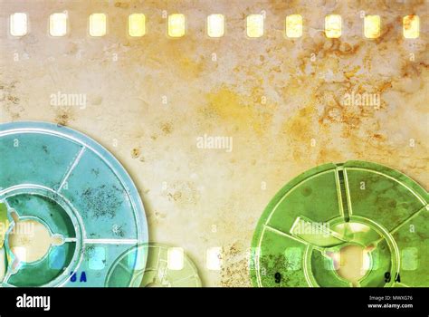 Vintage Sepia Film Strip Frame With Blue And Green Rolled Films Wall