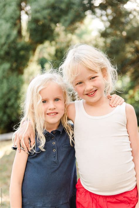 Two Little Blonde Girls Hugging By Léa Jones Little Blonde Girl Blonde Girl Blonde