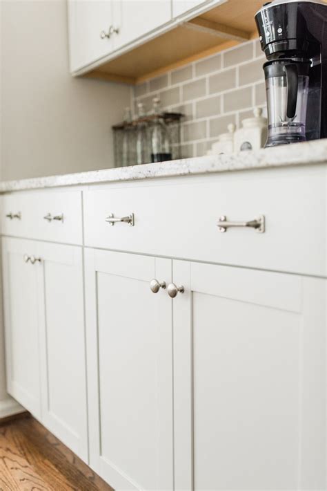 White and soothing blue kitchen boasts. Lowe's Stock Cabinets Review | Diamond Now Arcadia White Shaker Cabinets — Elizabeth Burns ...