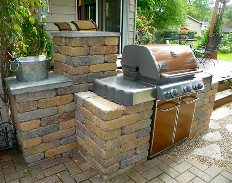 Created A Way To Take A Standard Weber Grill And Make It Look Like A Built In Outdoor Kitchen