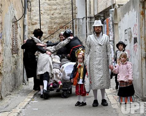 Photo Ulra Orthodox Jews Dress In Costumes On Purim In Jerusalem