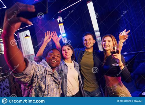 making selfie group of friends having fun in the night club together stock image image of