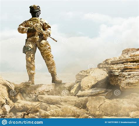 Soldier Standing On Desert Rocks Stock Image Image Of Attack Service