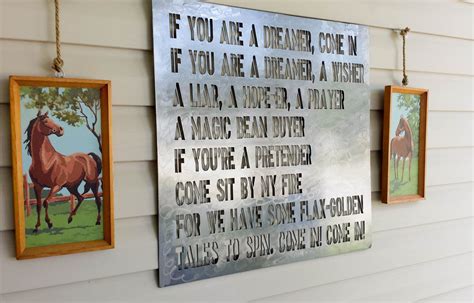 They are inserted behind the bottom of a piece of siding and clip onto the inside edge. How to Hang Decor on Vinyl Siding | Metal tree wall art, Wall decor design, Metal tree