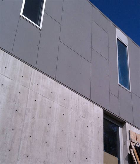 Swiss Pearl Cementitious Panel Installed At Concrete Wall Exterior