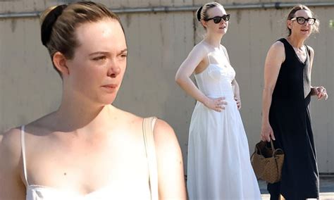 Elle Fanning Dons A Dainty White Summer Dress During Shopping Trip With