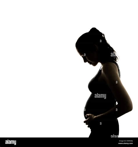 Pregnancy Baby Bump Silhouette Of A Young Standing Woman Side