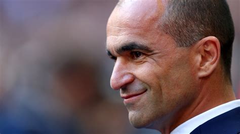 Along with a photo of lawnmowers and a suburban yard, he wrote. Soccer/Belgique : Le sélectionneur Roberto Martinez ...