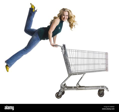 Excited Pushing Shopping Cart Woman Hi Res Stock Photography And Images