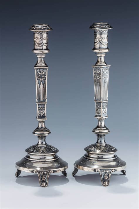 010 A Pair Of Silver Candlesticks By M J Greenstein