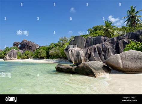 Anse Source Dargent Granite Rocks At Beautiful Beach On Tropical