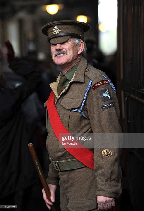 A World War Ii Reenactor Dressed As A British Army Sergeant Major