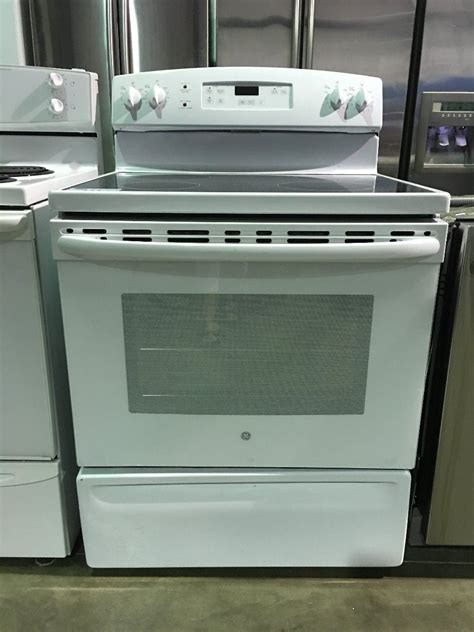 Ge White Glass Top 4 Burner Stove Able Auctions