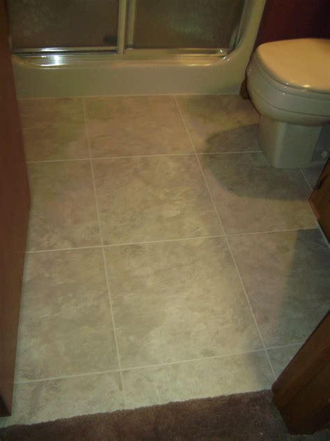 Vinyl tile (or sheet vinyl flooring for that matter) is a popular choice for bathrooms for many reasons, but the main one is without a doubt its great pricing. Knapp Tile and Flooring, Inc.: Luxury Vinyl Tile Bathroom ...