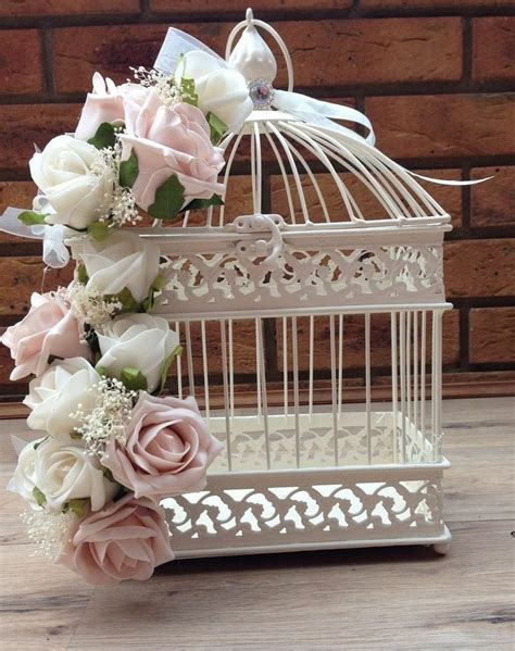 40 best dove cage centerpiece weeding images on pinterest birdcage centerpiece wedding floral