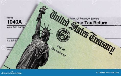Refund Check And Tax Form In Close Up View Editorial Image Image Of