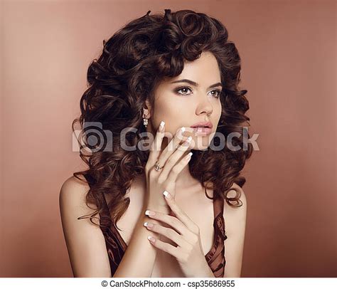Beautiful Woman With Long Curly Hair Makeup Manicured Nails Brunette With Healthy Brown