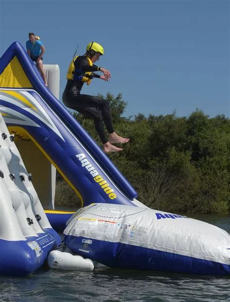 total wipeout themed aquapark with huge inflatables including climbing walls trampolines and