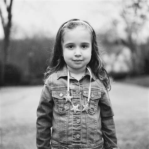 Black And White Portrait Of A Beautiful Young Girl In A Denim Jacket
