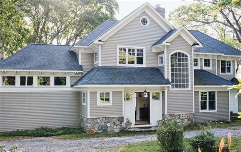 Many older homes, particularly in new england, are sided in white clapboards. Blue-Roof-Tan-Siding-.jpg (990×624) | Farmhouse paint ...