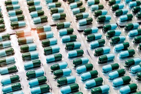 Closeup Green Blue Antibiotic Capsule Pills In Blister Pack