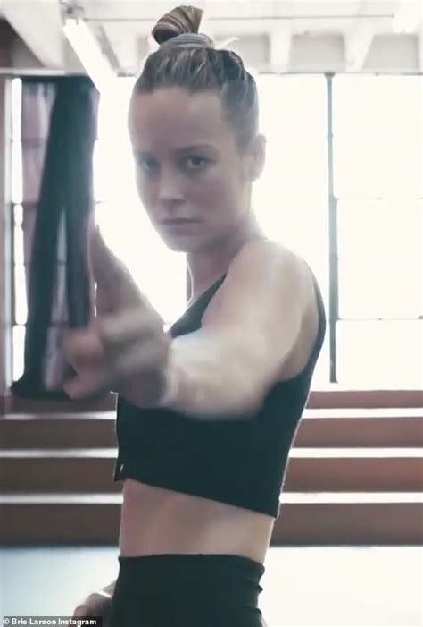 Brie Larson Shows Off Her Superhero Abs In Black Activewear As She Sweats It Out While Dancing