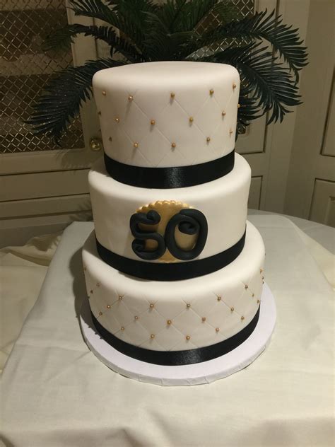 Black & gold 50th birthday celebration cake. | Celebration cakes, Cake, Birthday celebration
