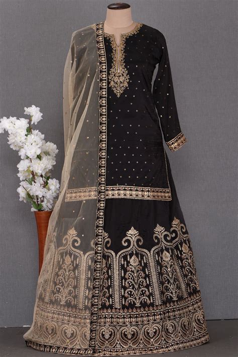 create the fashionista vibes by dressing in this party wear salwar suit from samyakk the attire