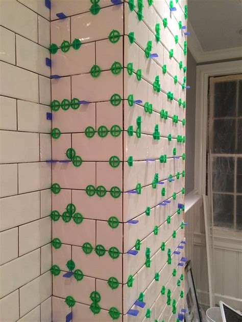 3 pro installation secrets daltile subway tile installed on a tub platform layout lines. The Subway Tiling Train is Chugging Along - Old Town Home