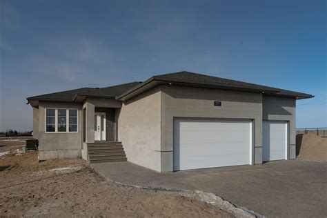 Besides building stunning custom homes, we also sell real estate in the regina area. The Baran - Exterior | Industrial buildings, Building a ...